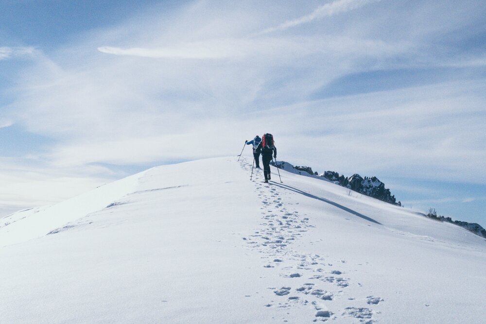 step by step walking up a mountain